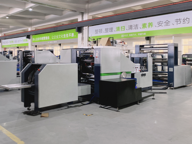 Two automated paper bag production machines in a modern facility