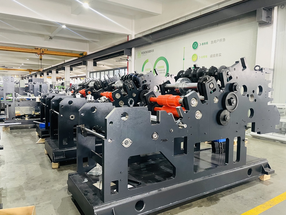 Heavy-duty components of new Paper Bag Machines on the factory floor